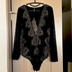 Black and gold lace mesh, deep vee, open back bodysuit